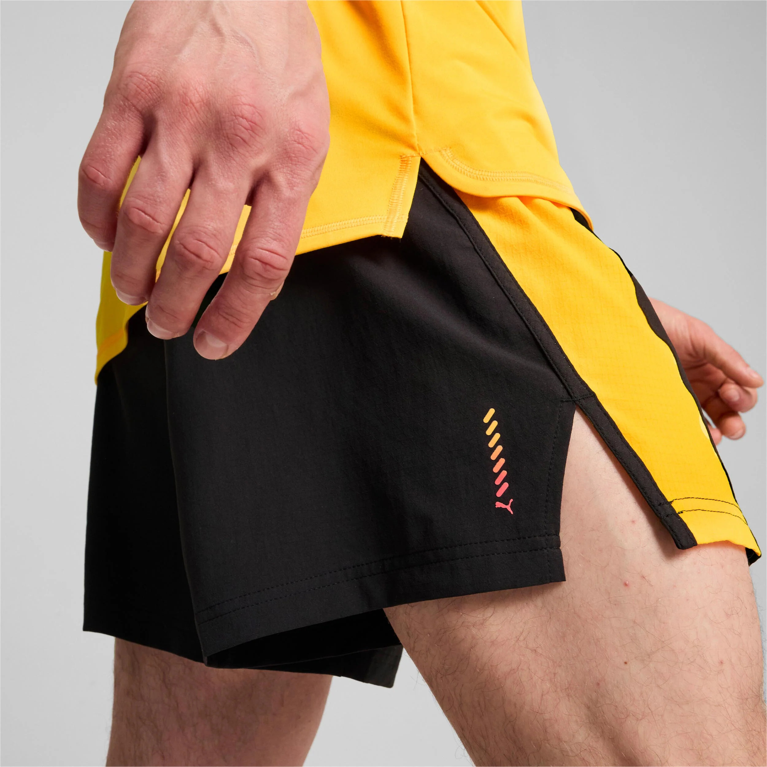 Run Velocity Ultraweave 5in Spodenki do biegania Mężczyźni - czarny, pomarańczowy - Image 7
